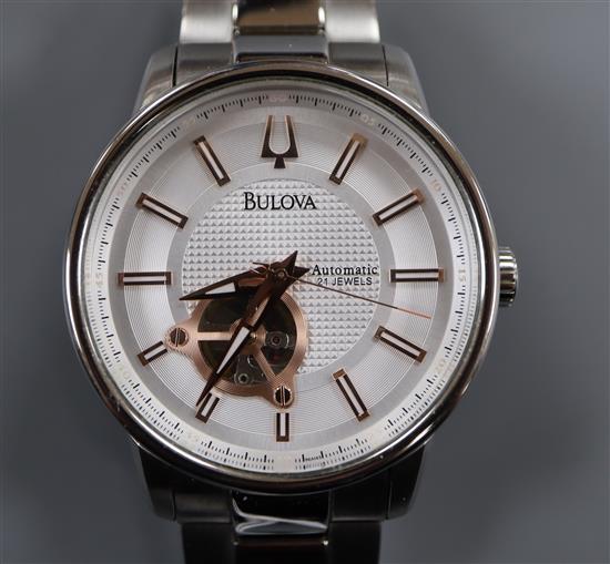 A gentlemans modern stainless steel Bulova automatic wrist watch with box.